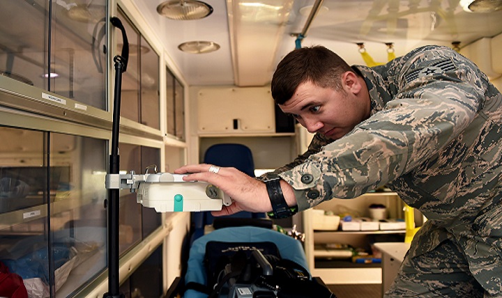 Air Force Staff Sgt. Matthew Gray, a 59th Medical Wing Emergency Medical Services paramedic, performs an operations check on the Perfuser Space Infusion Pump System, at the Wilford Hall Ambulatory Surgical Center, Joint Base San Antonio-Lackland.
