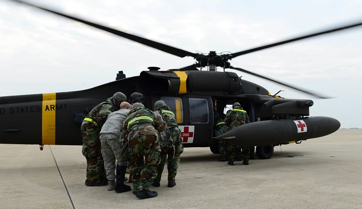 Air Force and Army medical personnel participated in a medical evacuation exercise as a part of the Vigilant Ace 16, a peninsula-wide exercise at Kunsan Air Base, South Korea. The medical evacuation exercise, or medevac, tested the 8th Medical Group’s ability to safely and quickly get injured personnel the help they need through air transportation provided by the Army. (U.S. Air Force photo by Senior Airman Ashley Gardner)
