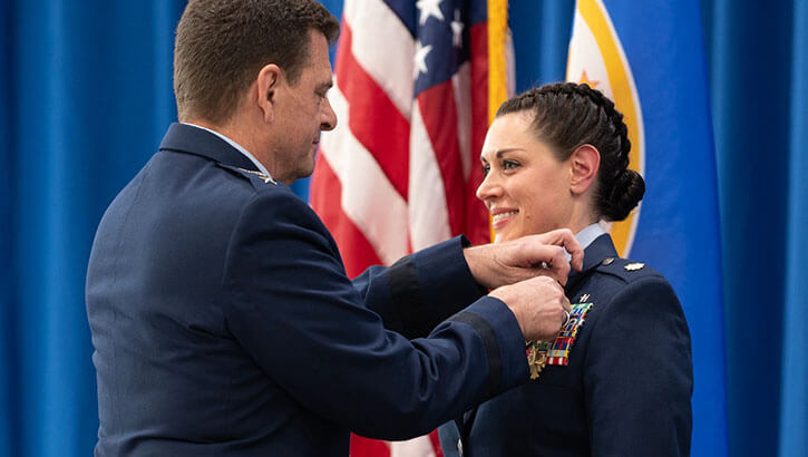 Katie Lunning receiving Distinguished Flying Cross