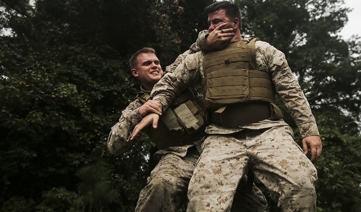 Navy Sailors with the 2nd Dental Battalion, 2nd Marine Logistics Group, practice gray belt techniques during a combat lifesaver and tactical casualty combat care training while integrating Marine Corps Martial Arts Program and patrolling. The exercise served to give the Sailors a basic understanding of MCMAP and patrolling fundamentals while maintaining TCCC standards, and to align their training and readiness standards with those of 2nd MLG. (U.S. Marine Corps photo by Cpl. Tyler Andersen)