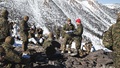 Service members on a mountain