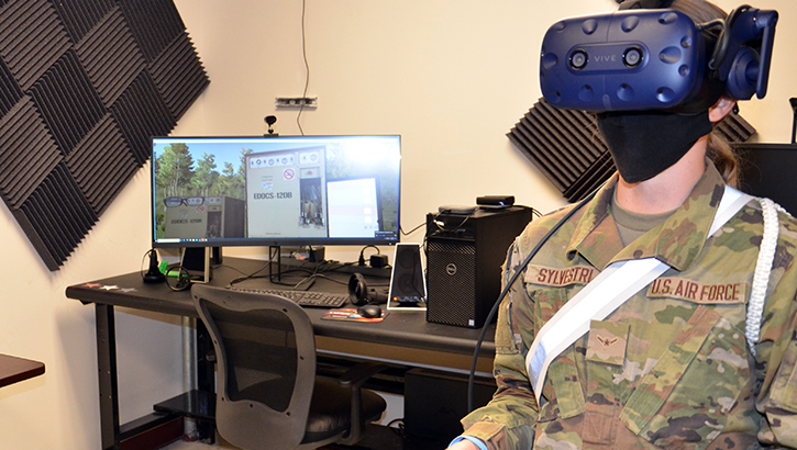 Image of Military personnel using virtual reality. Click to open a larger version of the image.