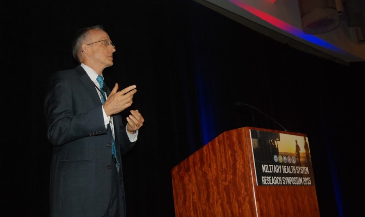 Dr. David Smith, deputy assistant secretary of Defense for Health Readiness Policy and Oversight, addresses attendees of the MHS Research Symposium in Fort Lauderdale, Florida. Smith said the knowledge learned at the conference will pay dividends for military medical research for years to come.