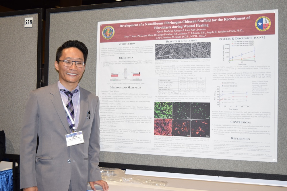 Photo By Katherine Berland | Dr. Tony Yuan from Naval Medical Research Unit - San Antonio presented a poster on the development of a nanofibrous fibrinogen-chitosan scaffold for the recruitment of fibroblasts during wound healing at the Military Health Systems Research Symposium, Kissimmee, Florida, August 29. (U.S. Navy Photo/Released/Katie Berland) 
