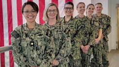 U.S. Navy Reserve Medical Service Corps officers, assigned to the U.S. Navy Bureau of Medicine and Surgery, pose for a group photo