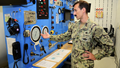 Military personnel demos compression chamber
