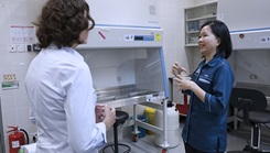 Jacelyn John (right), a laboratory technician, with the University of Malaysia Sabah, briefs U.S. Navy Capt. Franca Jones, commander, Naval Medical Research Command, about the university’s laboratory capabilities during an official visit focused on partnerships between the university and Naval Medical Research Unit INDO PACIFIC. Part of Navy Medicine Research & Development and headquartered out of Singapore, NAMRU INDO PACIFIC conducts research in cooperation with host nations in Vietnam, Laos, Singapore, Malaysia and Thailand to improve global health, ensure military force health protection, and address infectious diseases such as malaria, dengue fever virus and gastro-intestinal pathogens. (Photo by Tommy Lamkin/U.S. Navy) 