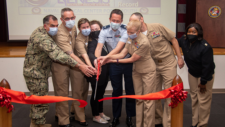 Military personnel at ribbon cutting ceremony