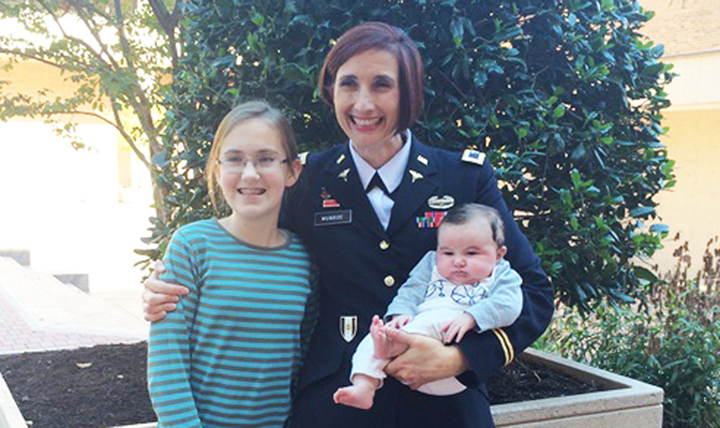 Army Col. Michelle Munroe, Women's Health advanced practice consultant to the Surgeon General at the Uniformed Services University of the Health Sciences in Bethesda, Maryland, has served as a midwife for several children.  