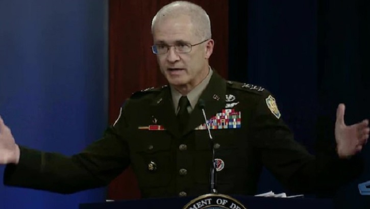 Image of Defense Health Agency Director Lt. Gen. (Dr.) Ronald J. Place speaking at a press conference.