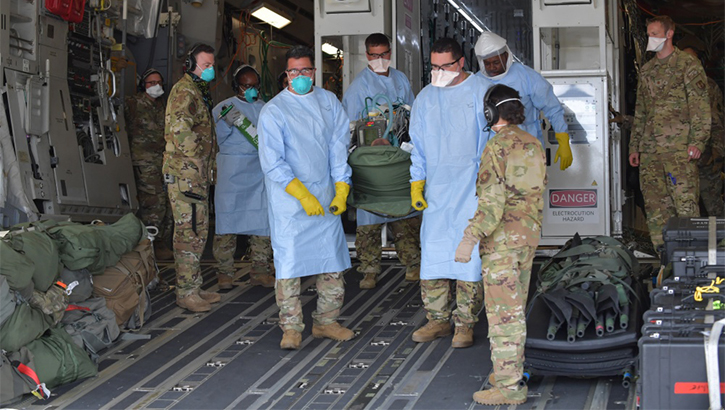 Image of 12 COVID-19 patients aboard a C-17 Globemaster III aircraft. Click to open a larger version of the image.