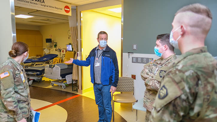 Oregon Army National Guard touring a hospital