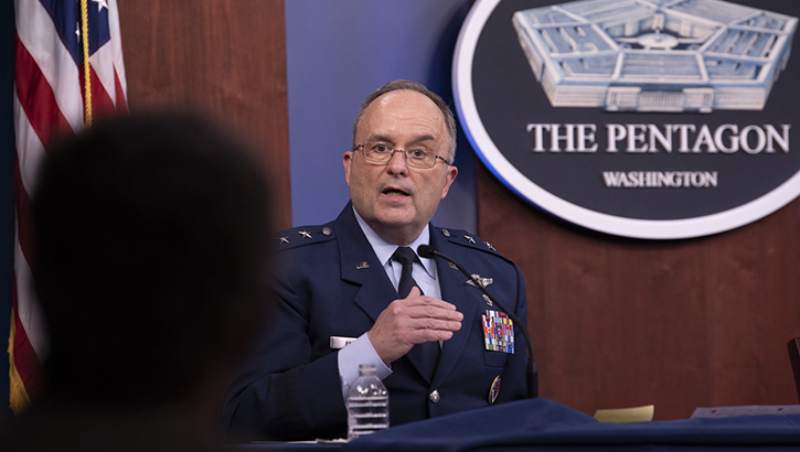 Image of Air Force Maj. Gen. (Dr.) Lee Payne speaking, with Pentagon sign behind him.