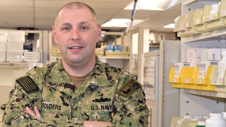 Navy personnel in a pharmacy