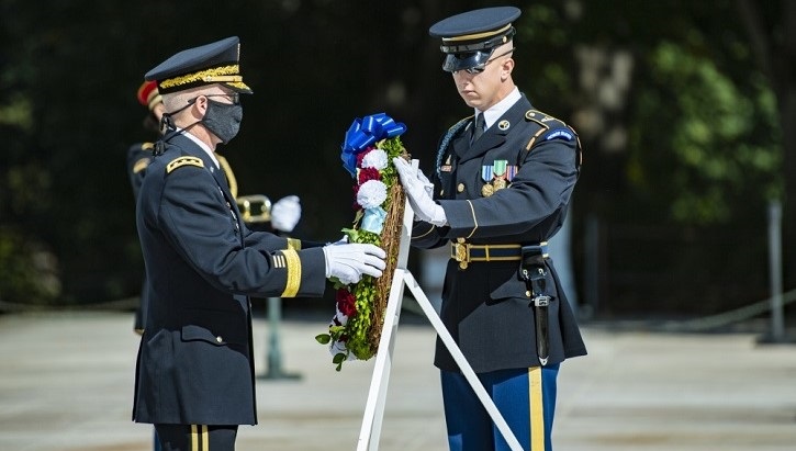 Image of Lt. Gen. Ronald Place holding a wreath at Arlington National Cemetery.