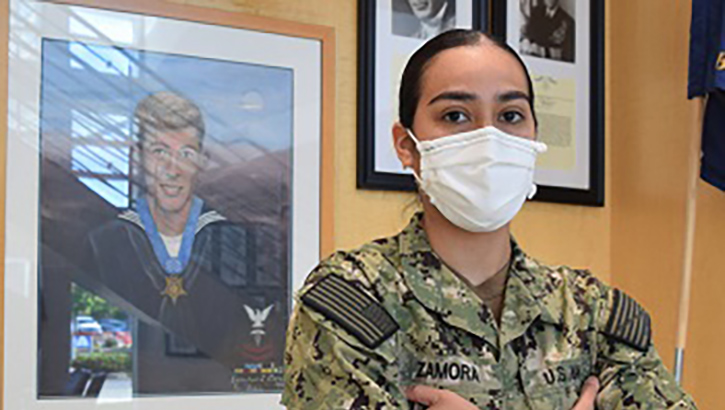 Image of Picture of military health personnel wearing a face mask posing . Click to open a larger version of the image.