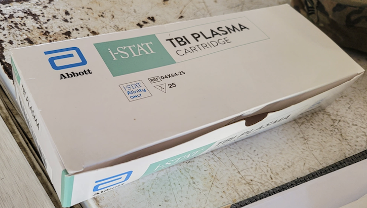 A box of traumatic brain injury plasma test cartridges sits ready for use as part of Global Medic, a Combat Support Training Exercise held at Fort Hunter Liggett, Calif., June 18, 2023. Members of the U.S. Army Medical Materiel Development Activity and the Medical Capability Development Integration Directorate participated in the exercise to gain feedback from end-users on the handheld, deployable TBI biomarker assessment system. (U.S. Army Courtesy Photo)