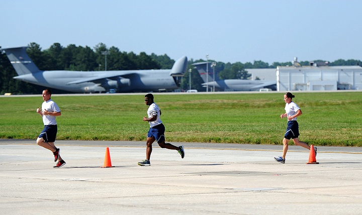 U.S. Air Force Airmen run laps around the flightline at Dobbins Air Reserve Base, Georgia. Shin splints – a common injury among athletes, particularly runners – refers to pain in the leg below the knee, usually on the inside part of your shin. This pain can be caused by micro-tears at the bone tissue, possibly caused by overuse or repetitive stress. (U.S. Air Force photo by Tech Sgt. Stephen D. Schester)