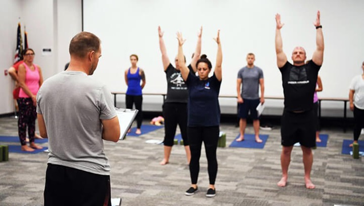 Image of Airman teaches yoga to a variety of Airmen in Springfield, Ohio, so they learn mental and physical resiliency.