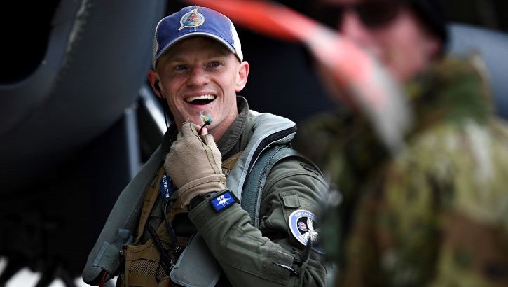 Military personnel laughing