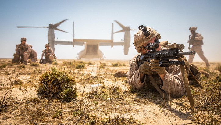 Image of A Marine posts security during an exercise on Karan Island, Kingdom of Saudi Arabia, April 23, 2020. . Click to open a larger version of the image.