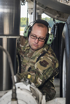 Soldier checking flight equipment