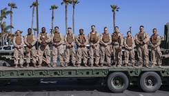 U.S. Navy Sailors assigned to I Marine Expeditionary Force pose for a group photo