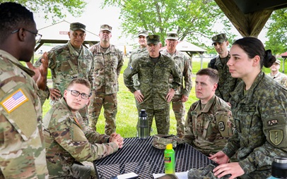 photo of National Guard Staff gathered at a picnic table