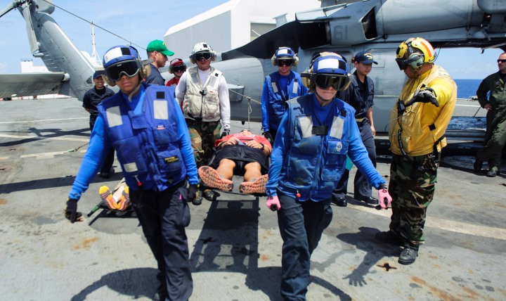 Crewmembers of the hospital ship USNS Mercy train to participate in a mass casualty drill during Pacific Partnership 2015 recently. The current stop in Vietnam will culminate in a disaster medicine drill where both U.S. and Vietnamese medical personnel will participate both on and off USNS Mercy.  (U.S. Navy photo by Mass Communication Specialist 3rd Class William McCann)