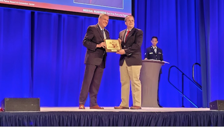 USU's Dr. Thomas Davis received the Military Health System Research Symposium's Distinguished Service Award this week. The award recognizes his contributions to research, focused specifically on the unique medical needs of the warfighter. (Photo credit: Sarah Marshall, USU)