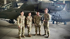 U.S. Army Staff Sgt. Matthew Pascual, U.S. Army Capt. Alyssa Mann, and U.S. Army Staff Sgt. Dex Nepomuceno, practice sample transportation protocols with the 16th Combat Aviation Brigade