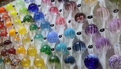 Soldiers present glass-blowing work at an adaptive reconditioning outing at the Fort Hood Soldier Recover Unit