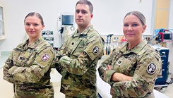 Winn Army Community Hospital's (From L to R) Capt. Natalia Kinser, chief nurse, intermediate care ward; Lt. Col. Daniel Bailey, chief of surgery; Capt. Alanna Whitfield, emergency room nurse