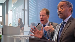 Keynote speaker Dr. Eric Elster, dean of USU's School of Medicine, (center) and USU President Dr. Jonathan Woodson delivered remarks on the digital transformation of healthcare