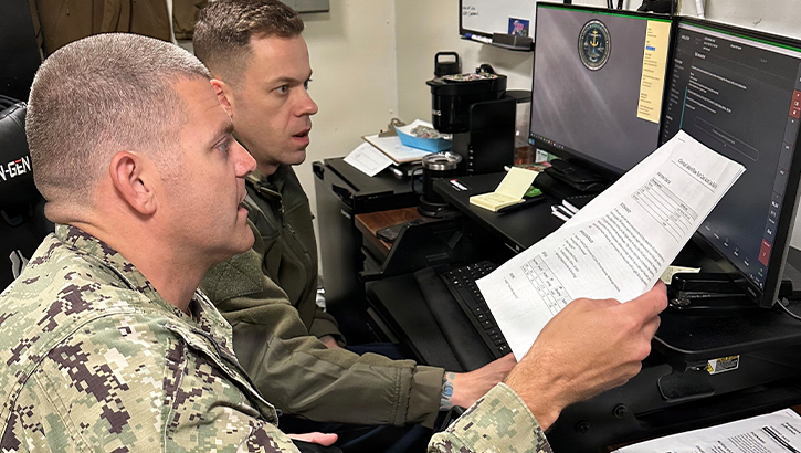 Lt. Harley Sheffield, Naval Medical Forces Pacific chief nursing informatics officer and the Joint Operational Medicine Information Systems (JOMIS) Clinical Data Provider (CDP) assessment action officer (left), and HMCS William Meyers, USS Essex (LHD 2) medical department lead chief petty officer, work together during an assessment of the JOMIS CDP