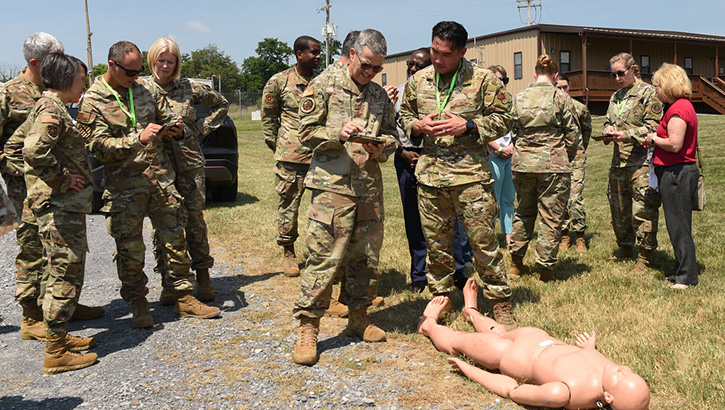 Lt. Gen. John J. DeGoes, Air Force and Space Force Surgeon General, accesses the Battlefield Assisted Distributed Observation Kit on a designated mobile device
