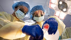 Teniente de Fragata Oscar Javier Martinez Flores, a Paraguayan Navy first lieutenant and orthopedic trauma surgeon, and Teniente Primero Maria Angelica Gonzalez Torres, a Paraguayan first lieutenant and occupational health physician, provide manual breathing support to an intubated patient