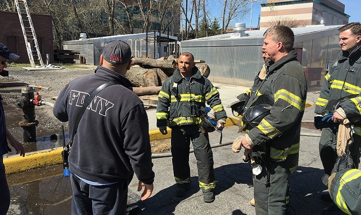 James Rodriguez, deputy assistant secretary of Defense for Warrior Care Policy (center), met and trained with wounded warriors during a visit Monday, April 18, to the Fire Department of New York's training facility. 