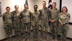 Five of the newest graduates from the Evans Army Community Hospital Clinical Nurse Transition Program pose for a picture