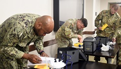 U.S. Army and U.S. Navy medical maintainers participate in a team-building event during a Healthcare Technology Management Week