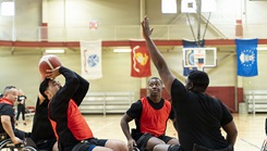 U.S. Army Cpl. Steven Carrasco, Joint Base San Antonio, Soldier Recovery Unit, attempts a shot during wheelchair basketball training during the JBSA Adaptive Sports Camp