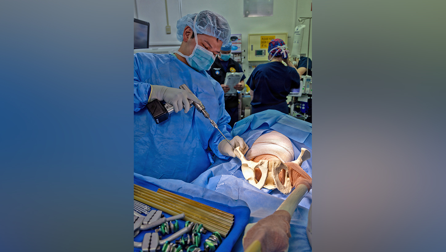 U.S. Naval Hospital (USNH) Yokosuka and Japan Self-Defense Force (JSDF) Hospital Yokosuka surgical personnel perform a simulated orthopedic procedure during a bilateral mass casualty drill