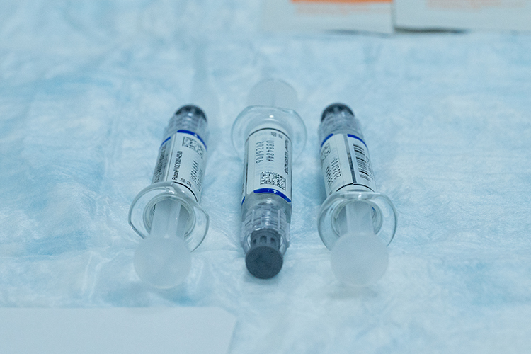 Image of MSMR 202610 Photo3_ToC_VaccineEffect_Flu_9418979.