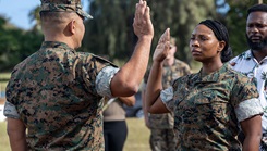 U.S. Navy Lt. j.g. Chantise Robinson recites the Navy’s Oath of Office during a commissioning ceremony on Marine Corps Base Hawaii, Dec. 6, 2024. After serving 16 years, the New Orleans, Louisiana, native commissioned from an enlisted Marine to a Navy officer—signifying a unique bridge between two branches, combining seasoned leadership experience with a new opportunity to serve and lead in a broader capacity. (Photo by U.S. Marine Corps Lance Cpl. Hailey Riddle-Chan)