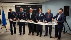From left: Brig. Gen. Robert Bogart, commander of the 711th Human Performance Wing; Chief Master Sgt. James Woods, medical enlisted force and enlisted corps chief, Office of the Surgeon General; Brad Wenstrup, former U.S. Rep. of Ohio; Col. Valerie Sams, director of the Center for Sustainment of Trauma and Readiness Skills (C-STARS) Cincinnati, U.S. Air Force, and trauma surgeon at University of Cincinnati (UC) Medical Center; Dr. Greg Postel, dean of the UC College of Medicine; and Cory Shaw, president and CEO of UC Health, cut the ribbon