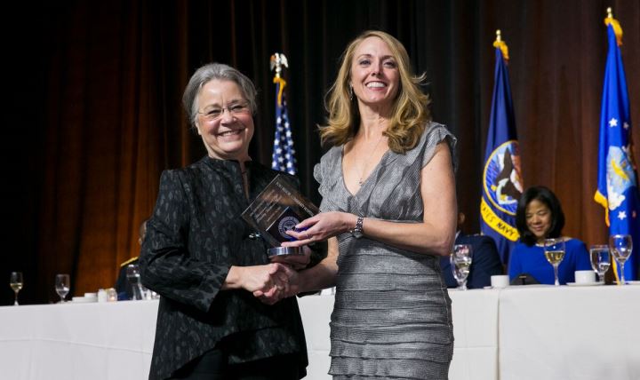 Dr. Robin Meadows, Outpatient Pharmacy Supervisor at Belvoir Hospital, accepted the 2016 Improved Access Award from the Association of Military Surgeons of the United States, at a ceremony in Washington Dec. 1. During the event, Navy Lt. Cmdr. Heather Shattuck was recognized as Nurse of the Year by the organization. This is the third year in a row that the honor has gone to a Belvoir Hospital nurse.