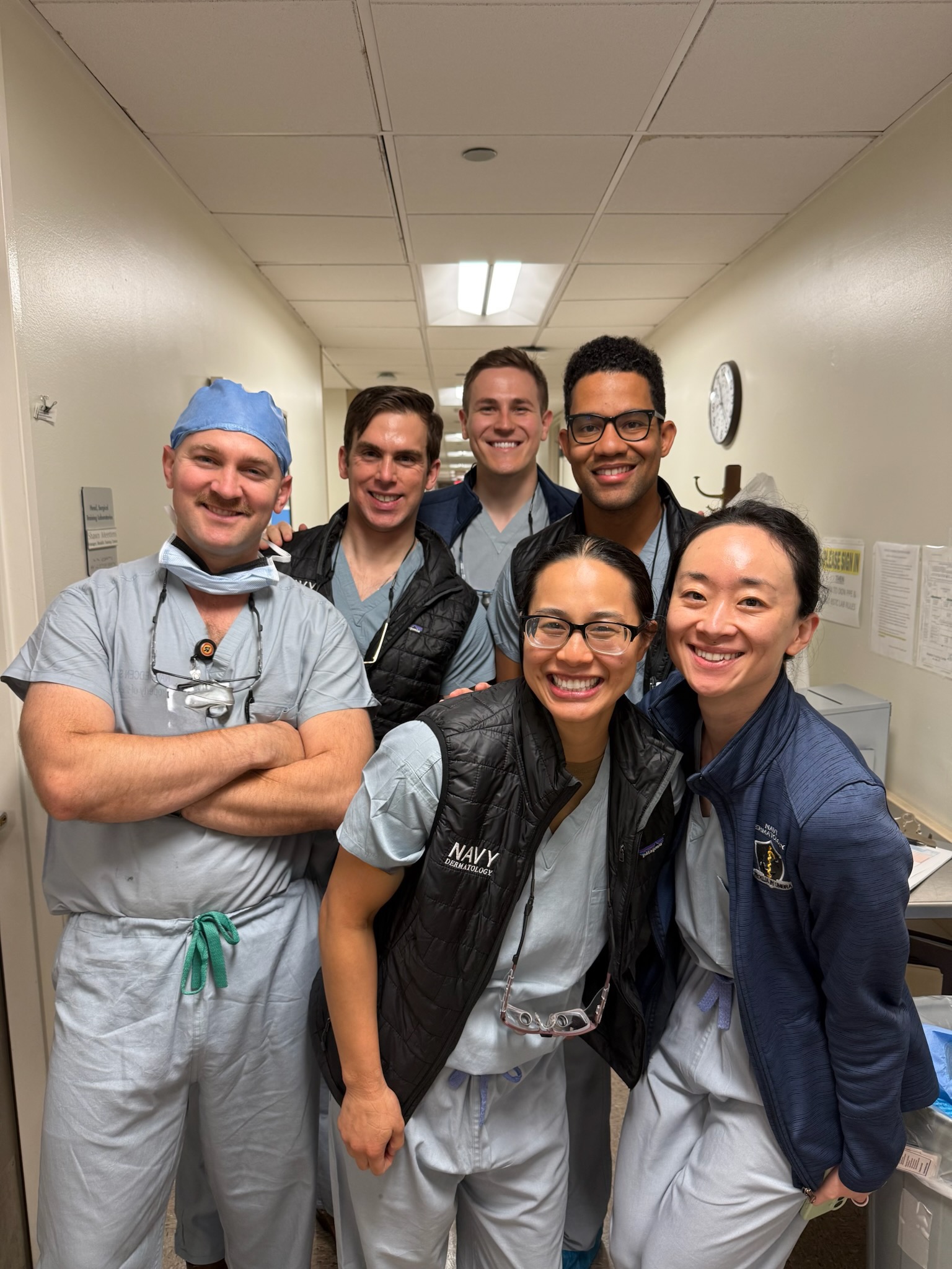 Dermatology residents preparing for a cadaveric laboratory experience