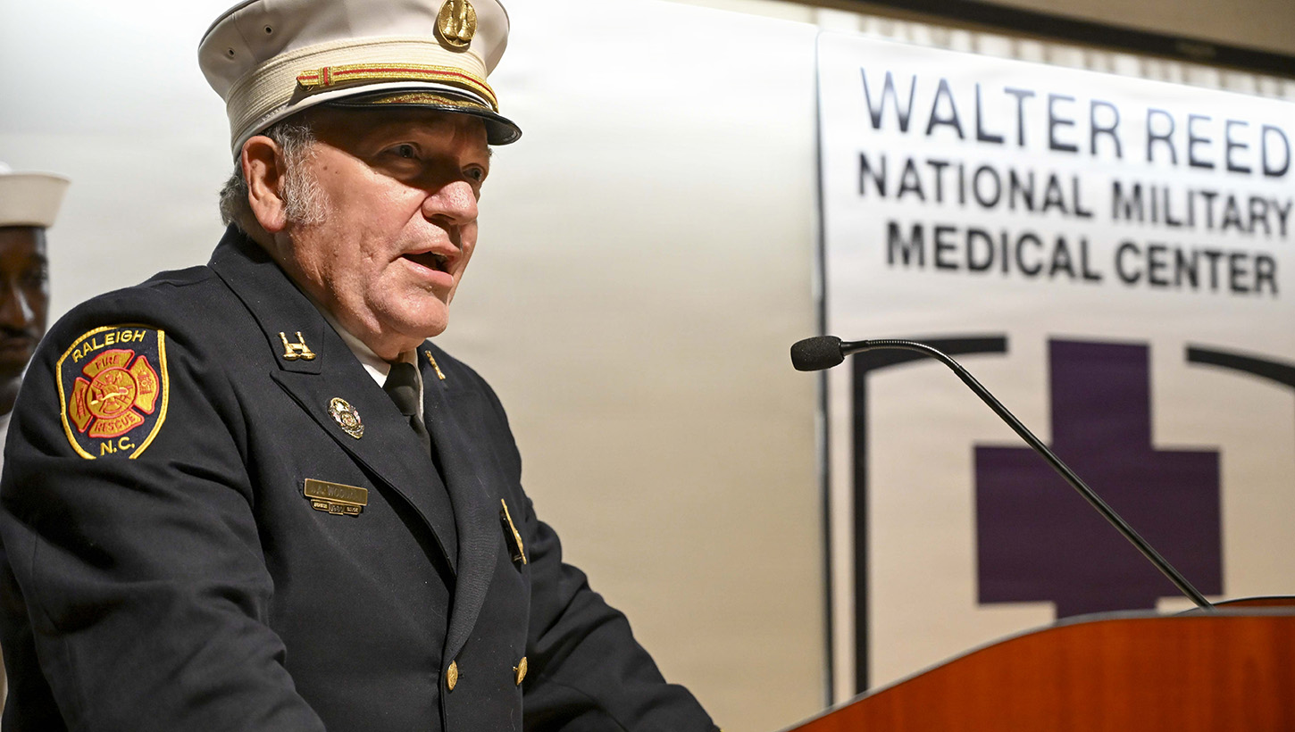 Photo of Capt. John Woodwall speaking