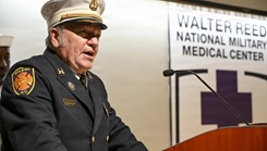 Photo of Capt. John Woodwall speaking