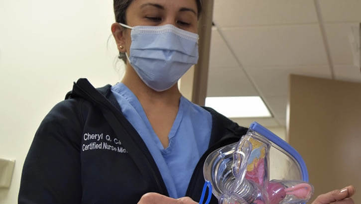Bremerton nurse midwife demonstrates vaginal ring placement